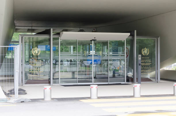 World Health Organization entrance glass in Geneva, Switzerland stock photo