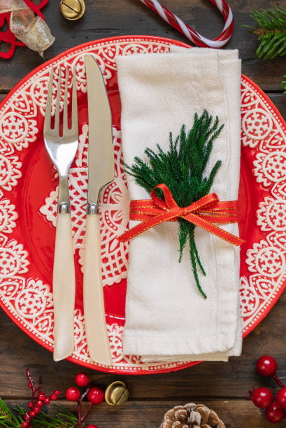 istock Festive table setting with fir tree branches and Christmas decorations 1346178173