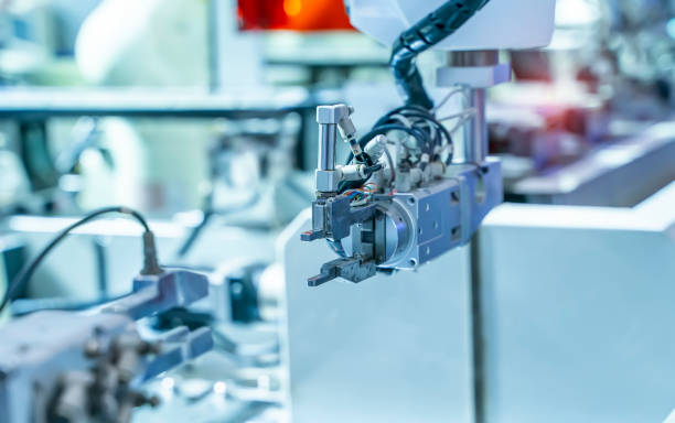 istock Automatic industrial robotic robot working, industry 4.0 and technology concept 1346180922