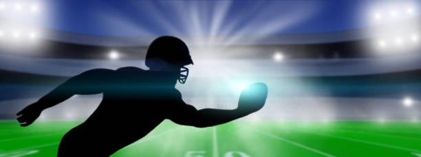 istock American Football player on stadium background. 1346182388