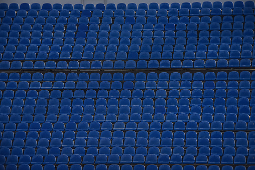 Dirty seats at the stadium without the visitors.
