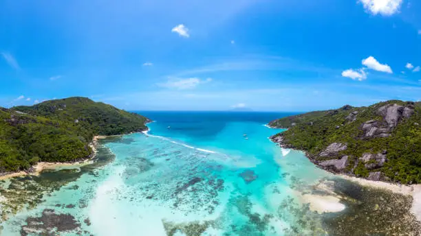 Aerial view from the bay Baie Ternay Beach in the Baie Ternay Marina National Park on Mahé in the Seychelles