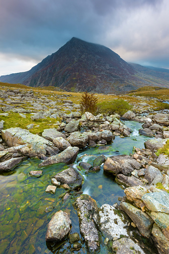 Wide angle view of Pen yr Ole Wen Mountain and river at Cwm Idwal, Snowdonia National Park, Wales, UK