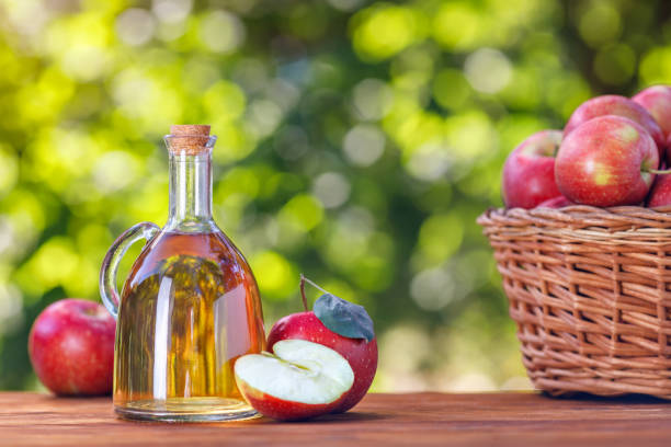 istock apple vinegar or cider in glass bottle outdoors 1346188501