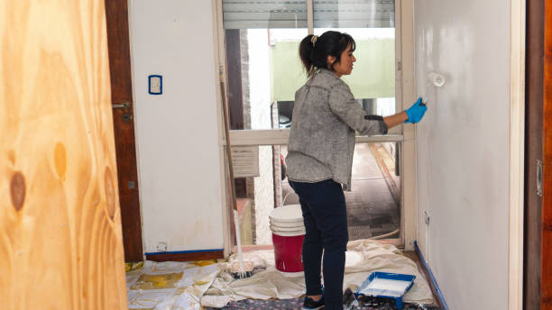 istock woman painting 1346188735