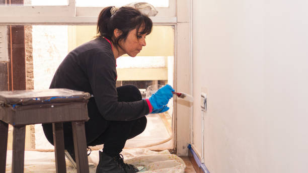 istock woman painting 1346188781