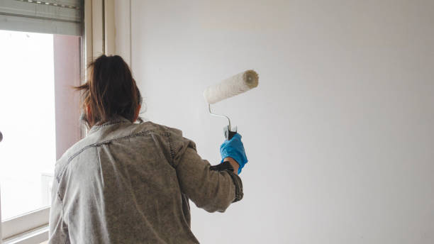 istock woman painting 1346188845