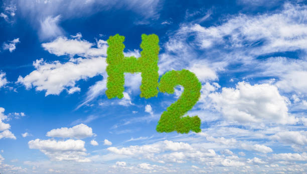istock Green Hydrogen concept: The letters H2 as green grass on blue sky with clouds. 1346188894