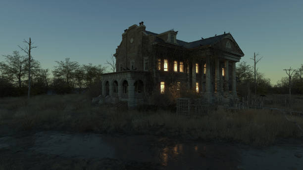 istock Ominous dilapidated and abandoned mansion with illuminated interior lighting at dusk. 3D rendering. 1346190691