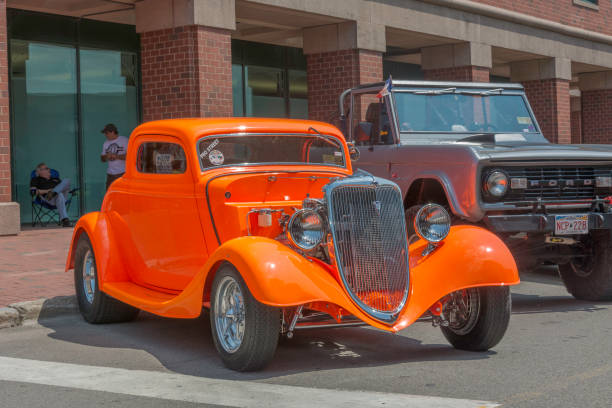 1934 Ford 3 window coupe hot rod Moncton, New Brunswick, Canada - July 10, 2015  : 1934 Ford 3 window coupe parked in downtown Moncton during 2015 Atlantic Nationals, Moncton, NB Canada. 1934 stock pictures, royalty-free photos & images