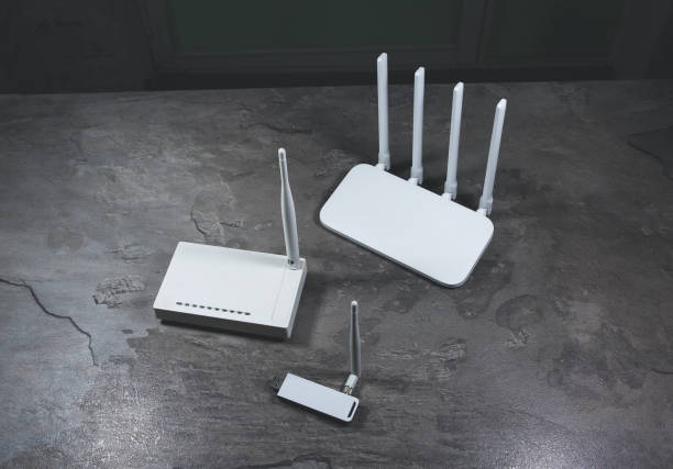 istock Three different types of Wi-Fi routers, modern and old technology. Wireless ethernet connection signal. 1346198730
