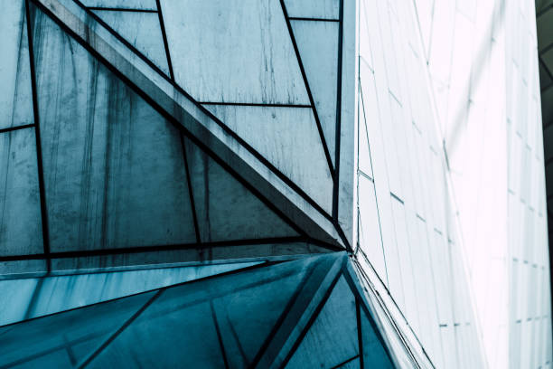 istock underside panoramic and perspective view to steel blue glass high rise building skyscrapers, business concept of successful industrial architecture 1346198735