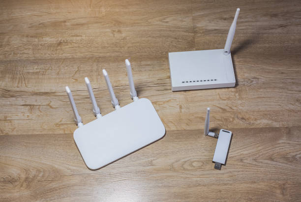istock Three different types of Wi-Fi routers, modern and old technology. Wireless ethernet connection signal. 1346198764