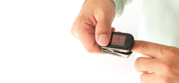 istock Banner patient holding electronic oximeter or oxymeter 1346200523