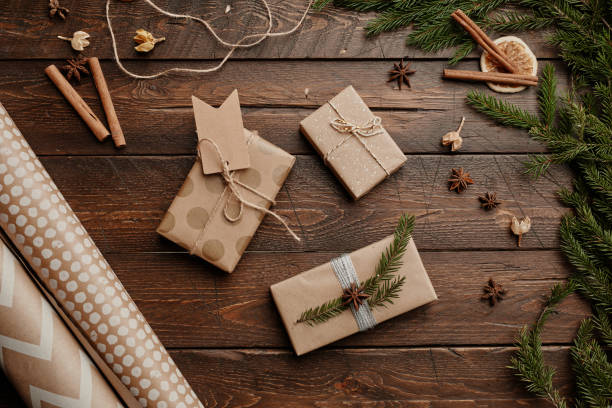 istock Christmas Gifts on Wooden Background 1346201619