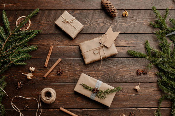 istock Christmas Presents on Wooden Background 1346201620