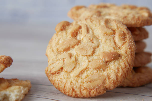 istock stack of peanut cookies on wooden background 1346201832