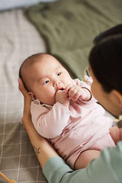istock Little child looking at her mother 1346203513