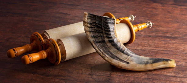 istock A Shofar Rams Horn and a Tora Scroll on a Wooden Table 1346203685