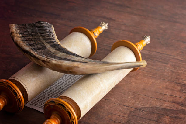 istock A Shofar Rams Horn and a Tora Scroll on a Wooden Table 1346203759