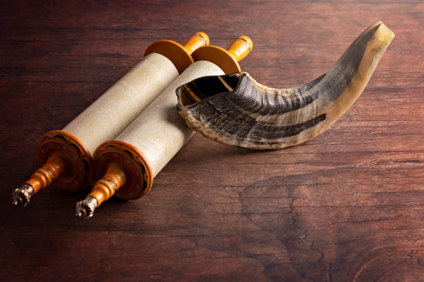 istock A Shofar Rams Horn and a Tora Scroll on a Wooden Table 1346203760