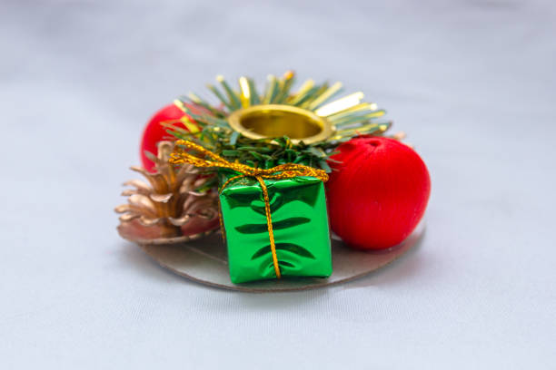 istock Christmas-themed candle holder on a white background 1346204814