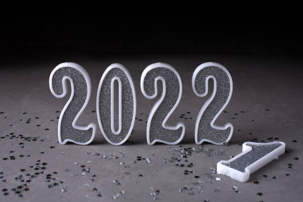 istock New year concept, silver numbers 2022 on gray background, greeting card. 1346205082