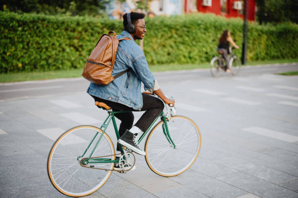 istock Young hipster man in the urban streets commuting 1346206584