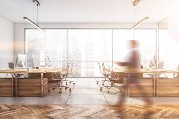 istock Blurred businessman wearing formal suit is walking inside office 1346207235
