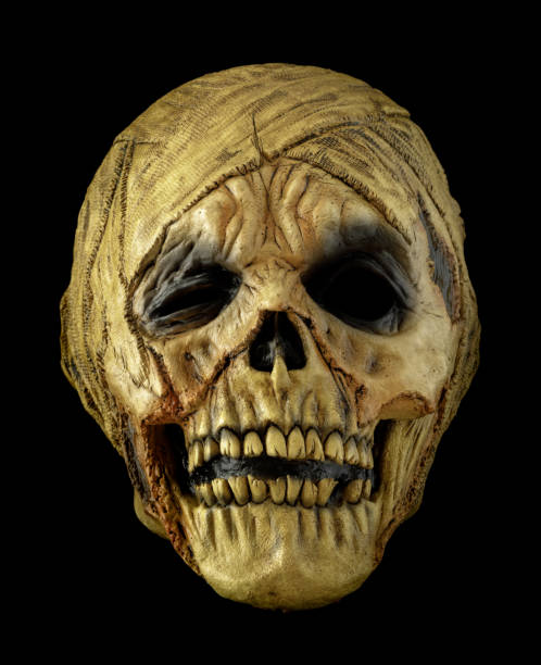 istock Rotting Mummy Mask Isolated Against Black Background 1346208256