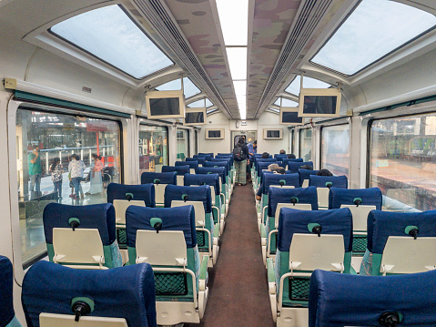 Pune, India - October 10 2021: Interior layout of seats inside the vistadome ac tourist car coach of the Deccan Queen at Pune Station India.