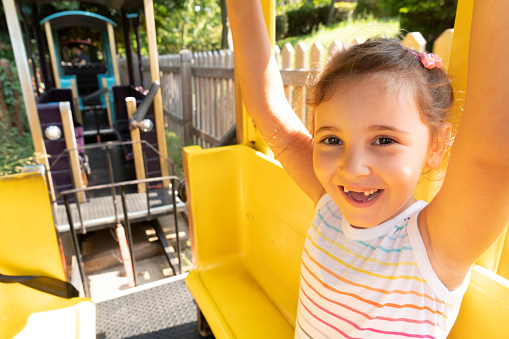 Cute little girl in amusement park