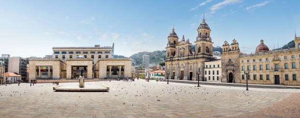 Panoramic view of Bolivar Square with the Cathedral and the Colombian Palace of Justice - Bogota, Colombia Panoramic view of Bolivar Square with the Cathedral and the Colombian Palace of Justice - Bogota, Colombia historic district photos stock pictures, royalty-free photos & images