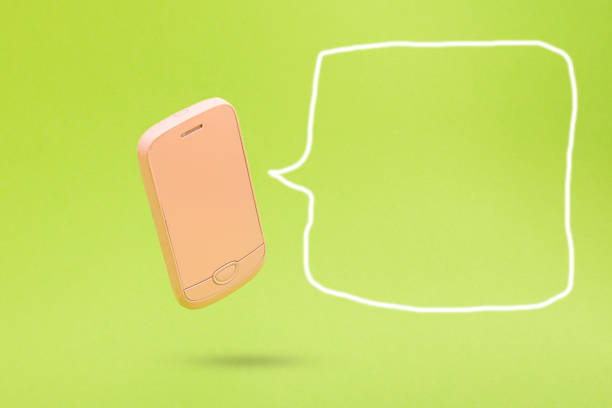 istock Blank speech bubble with pink 3d smartphone icon against green background. 3D illustration design template background. Top mobile phone message. Advertisement idea. Empty speech balloon for ad 1346220488