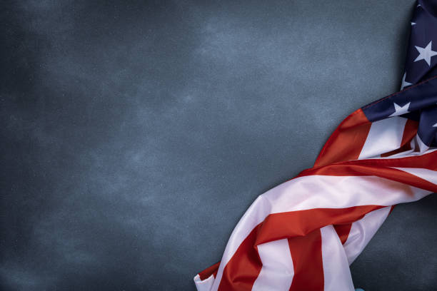 istock Vintage american flag on grunge background with space for text 1346221985