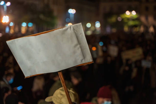istock A white blank banner or card board during protest or strike 1346226171