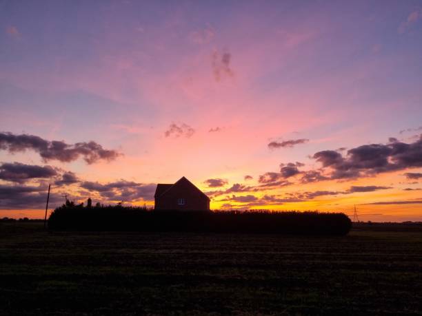 istock Incredible Sunset behind a House 1346228904
