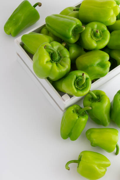 istock bell pepper, green pepper, pepper on white background 1346229710