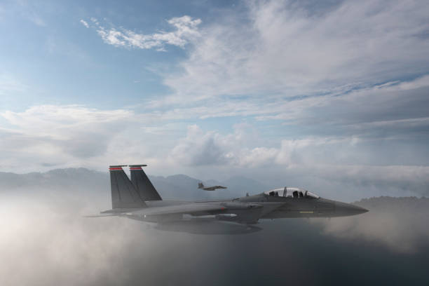 istock Jet aircraft flying over the clouds. 1346230995