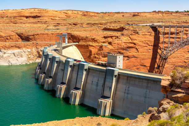 Glen Canyon Dam at Colorado river Glen Canyon Dam and Glen Canyon Dam Bridge at Colorado river in a sunny day, Arizona, USA glen canyon dam stock pictures, royalty-free photos & images