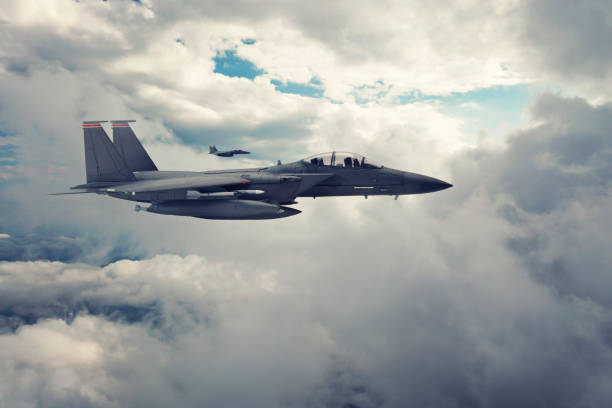istock Jet aircraft flying over the clouds. 1346232498