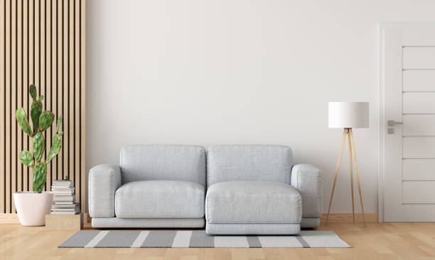 istock Gray sofa in white living room with copy space, 3D rendering 1346232559