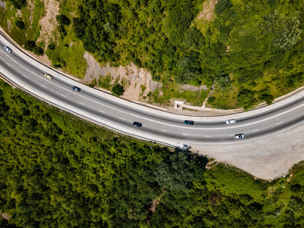 istock Road in the mountains directly above. Aerial view 1346233219