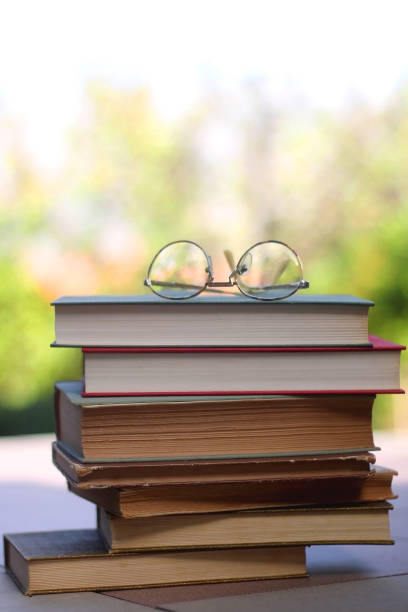 istock Vintage Books and Reading Glasses 1346235345
