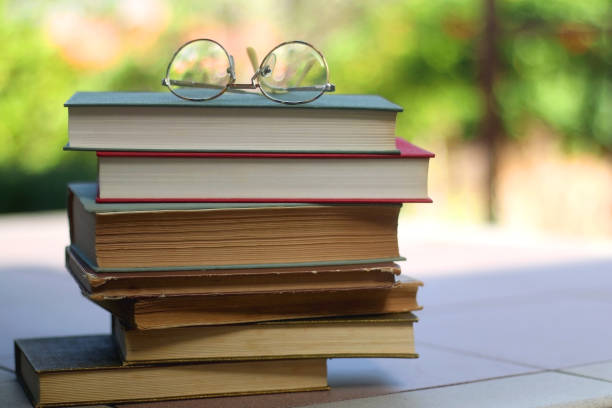 istock Vintage Books and Reading Glasses 1346235346