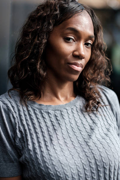 istock Mature black woman posing and looking to camera. 1346235583