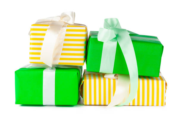 istock Colorful stacked gift boxes isolated on white background 1346239433