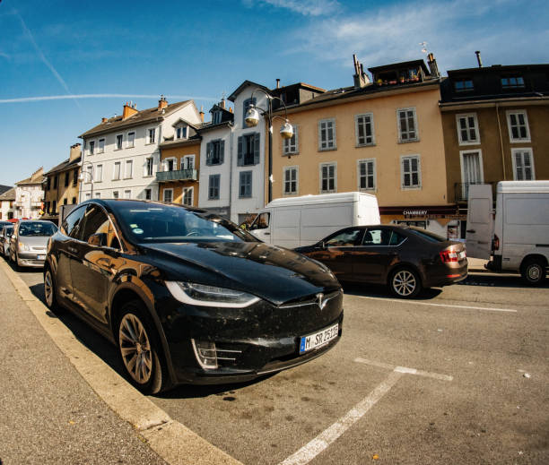 tesla model x suv car parked street wide angel lens - capital letter flash imagens e fotografias de stock