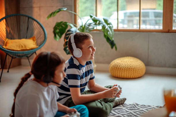 istock Kids playing video games 1346249371