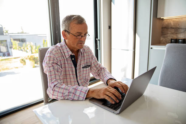 istock Mature Man Working From Home 1346252169